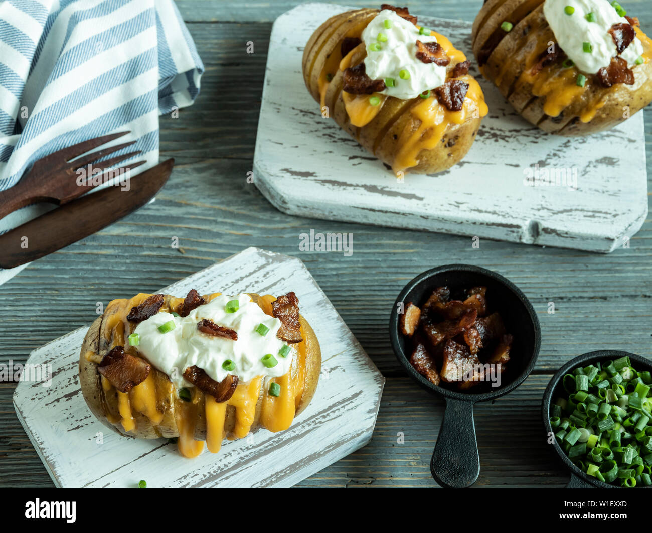 baked potato stuffed with cheese, bacon and sour cream, loaded