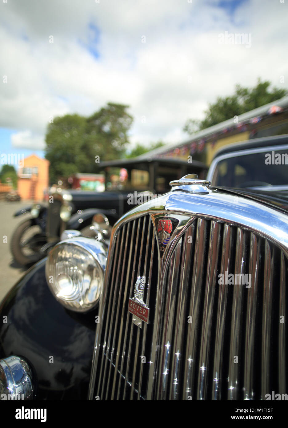 A 1940's vintage Rover showing the chrome grille and badge Stock Photo ...