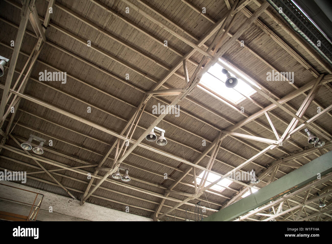 ceiling with windows in factory hall Stock Photo