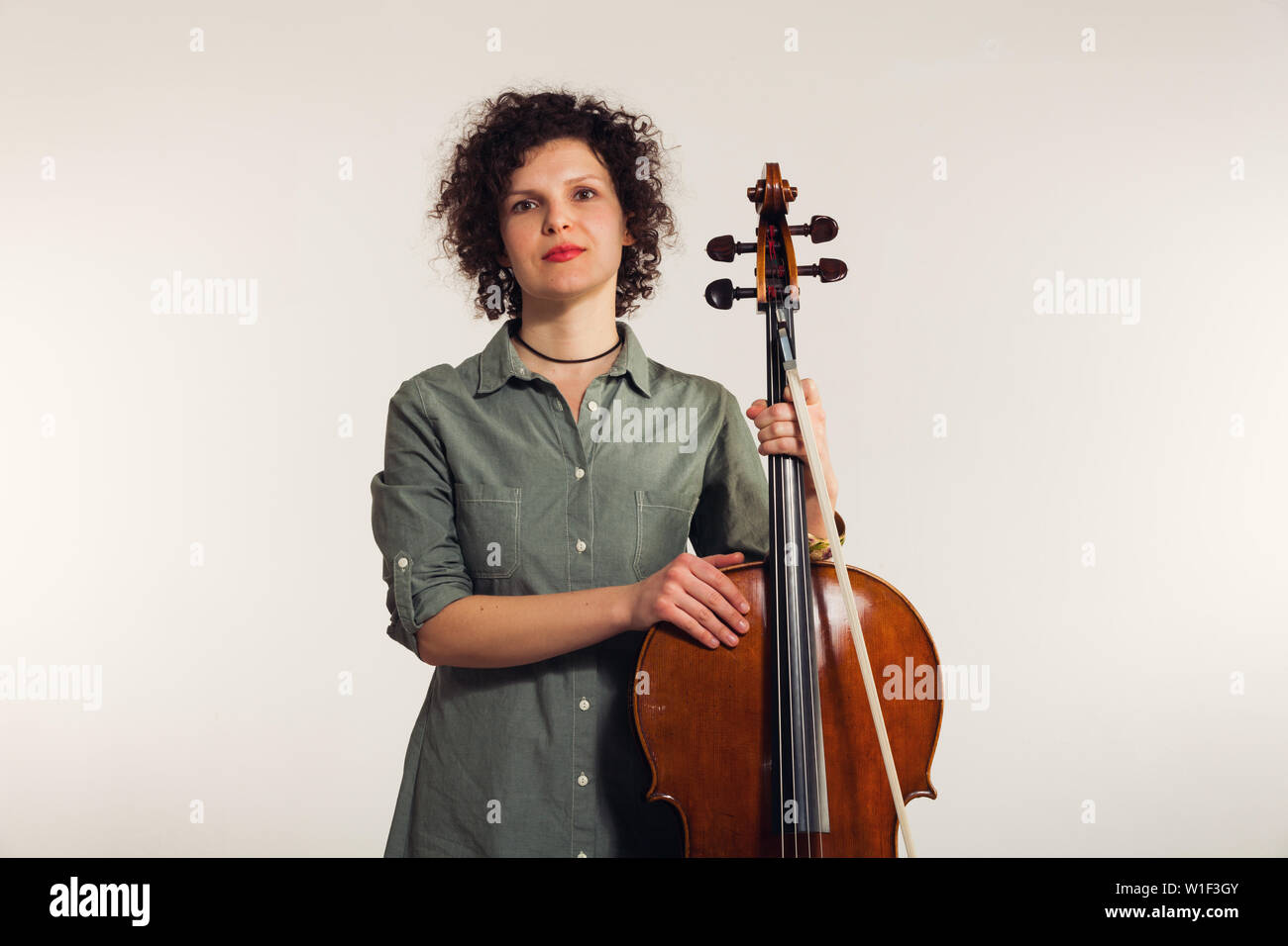 Portrait studio musician with his musical instrument. Year 2017 Stock ...