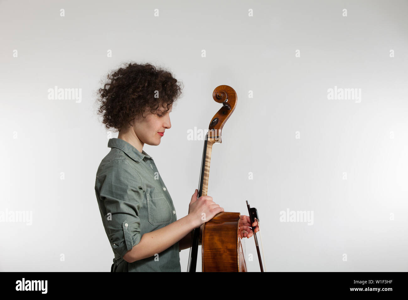 Singer Using Instruments Portrait studio musician with his musical instrument Stock Photo - Alamy