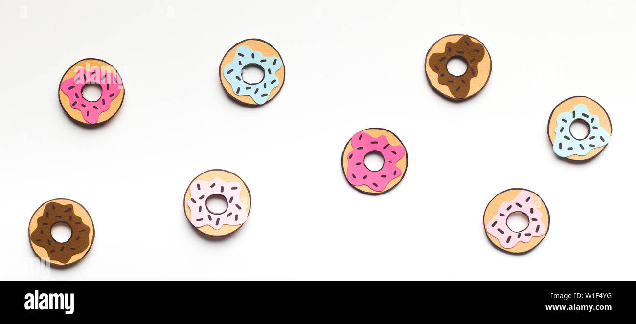 Summer background with fresh donuts on white background Stock Photo