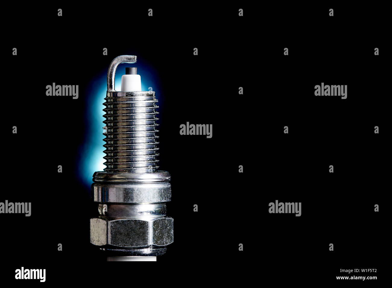 Spark plug for internal combustion engine.Сopy space. Stock Photo