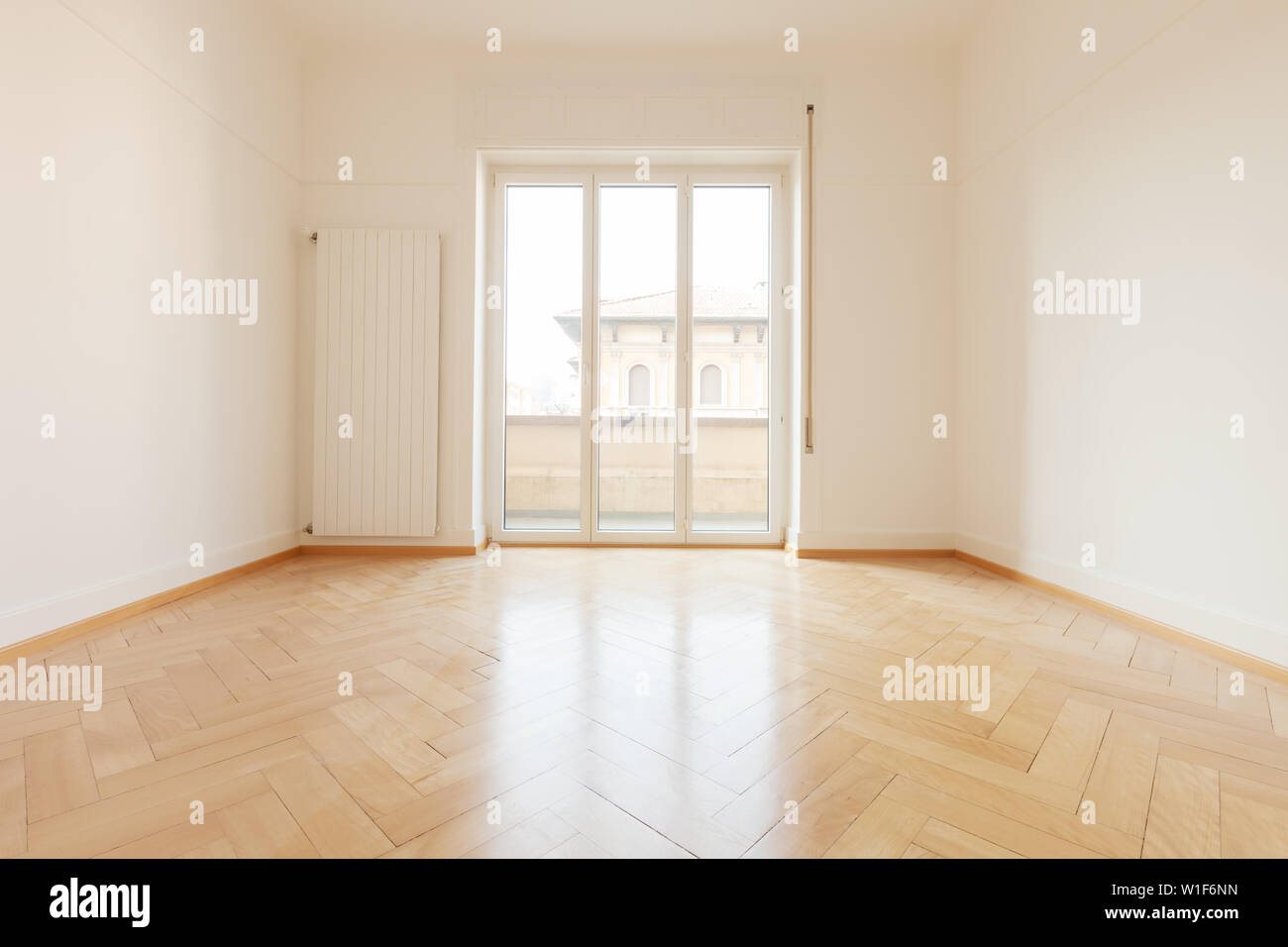 Empty room with nobody inside, the parquet is beautiful Stock Photo