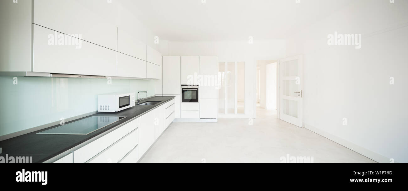 Interior of white modern kitchen, nobody inside Stock Photo