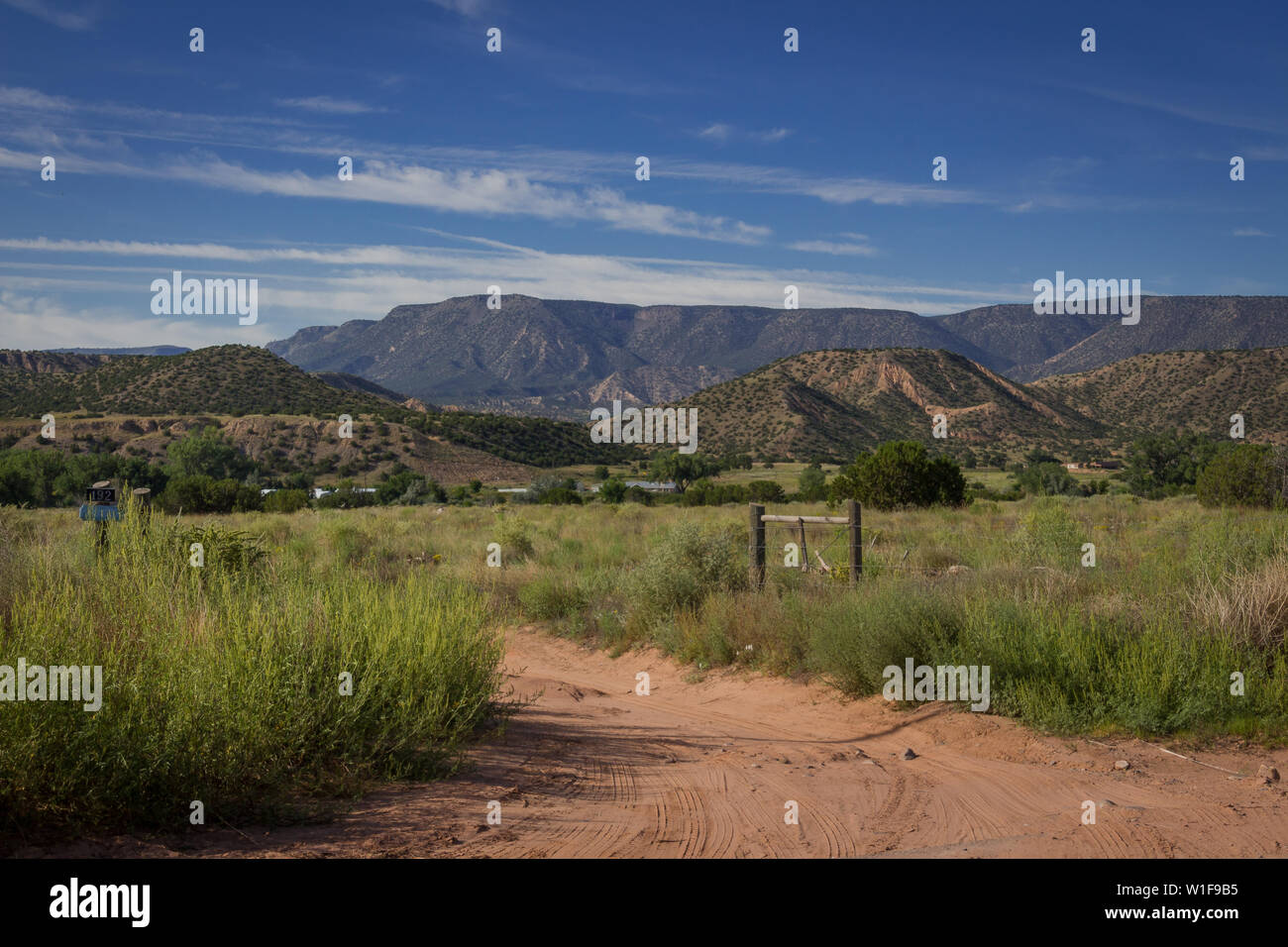 Summer afternoon at a farm gate in New Mexico Stock Photo - Alamy