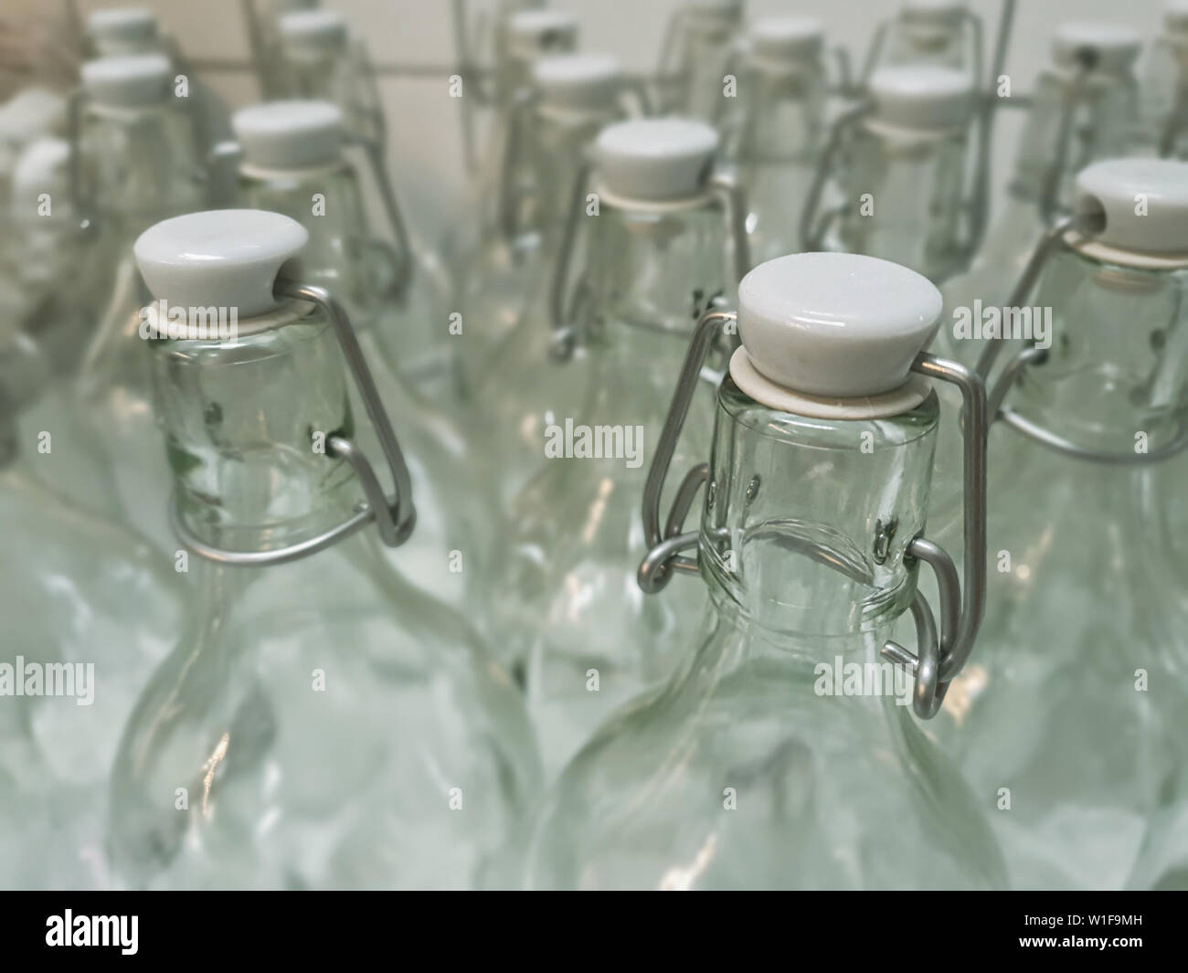 Retro bottle. Empty old glass bottles background. Stock Photo