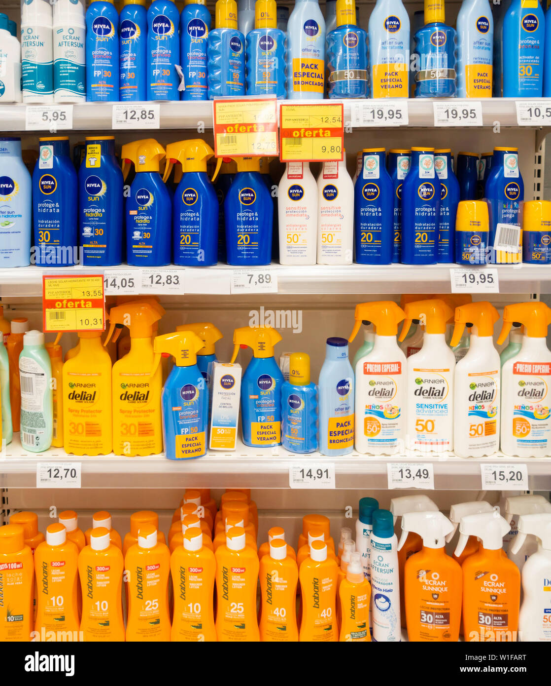 Sun cream, lotion in Spanish supermarket. Stock Photo