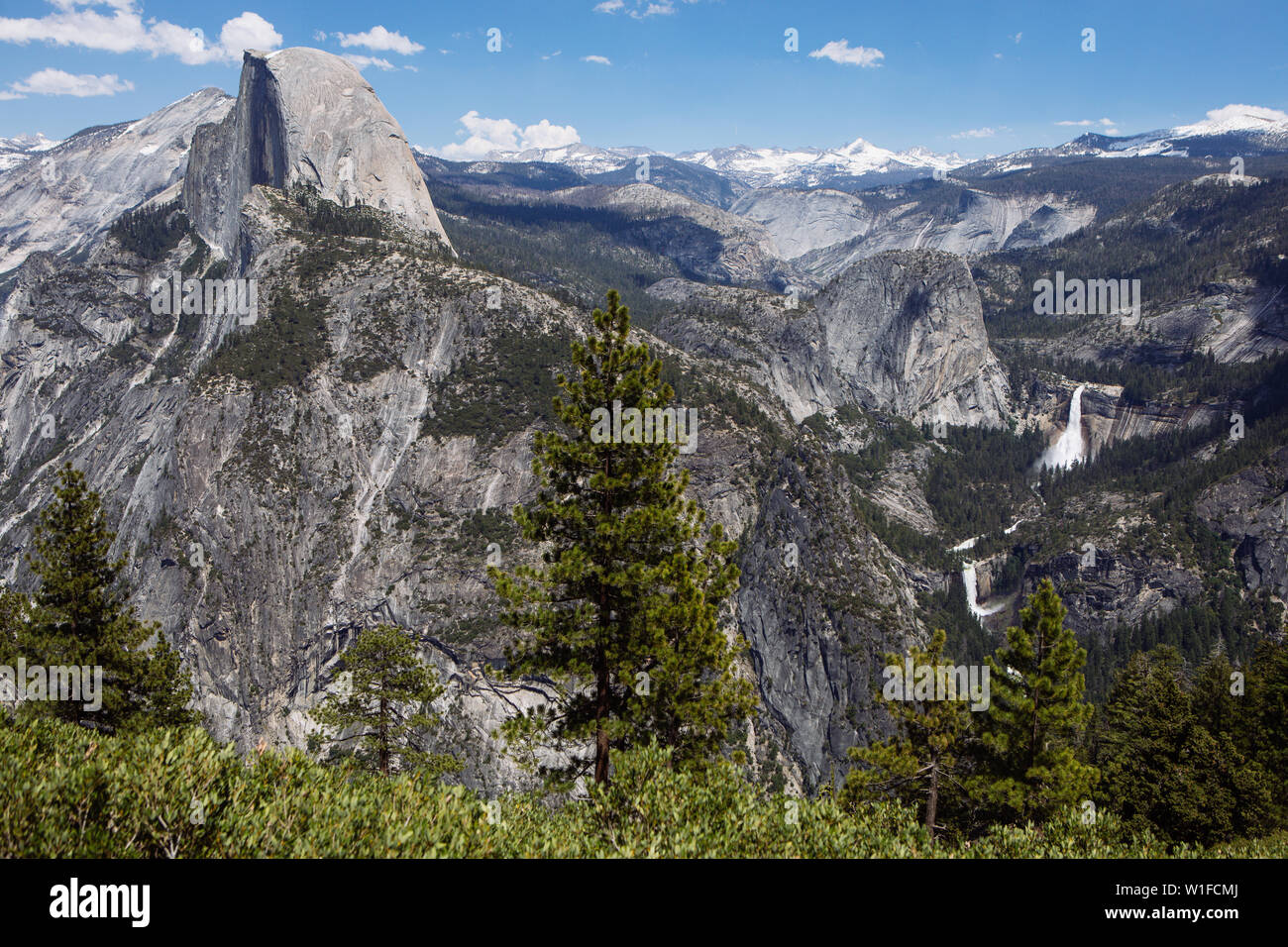 Ladscape View of the Nevada Fall, Half Dome and Yosemite Valley from Glacier Point in Yosemite National Park, California, USA Stock Photo