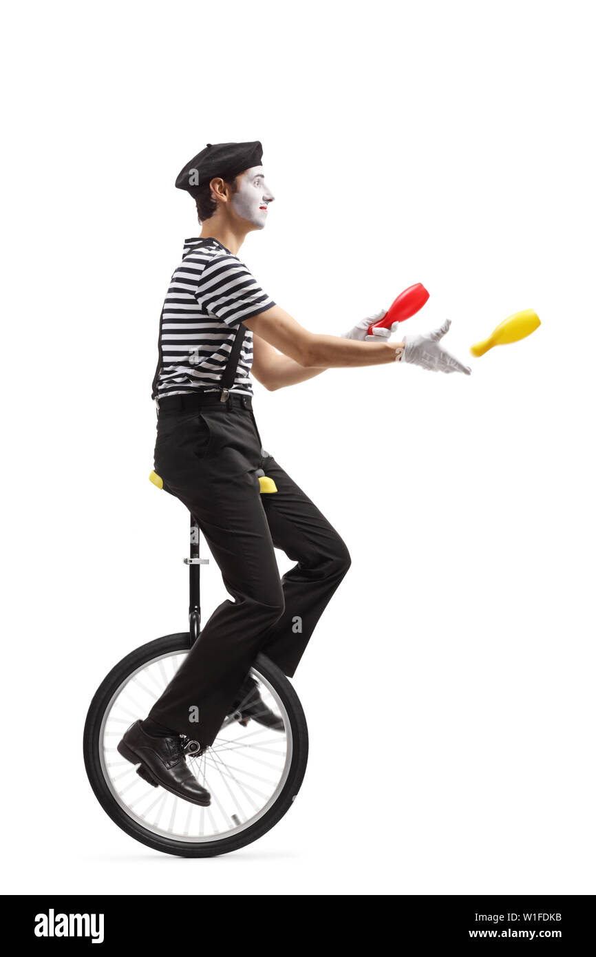 Juggling On A Unicycle Stock Photos & Juggling On A Unicycle Stock Images Alamy