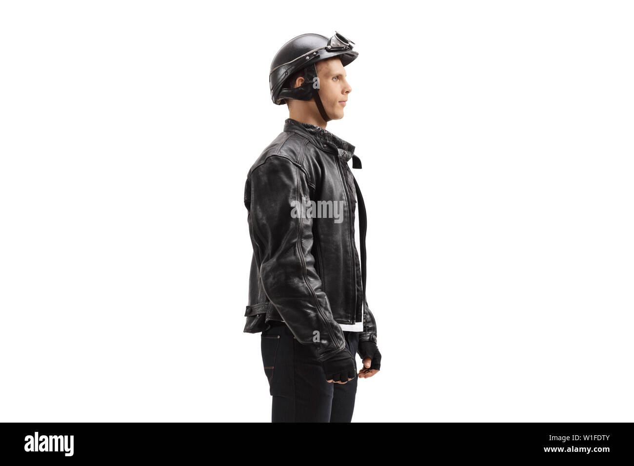 Young male biker waiting in line isolated on white background Stock Photo