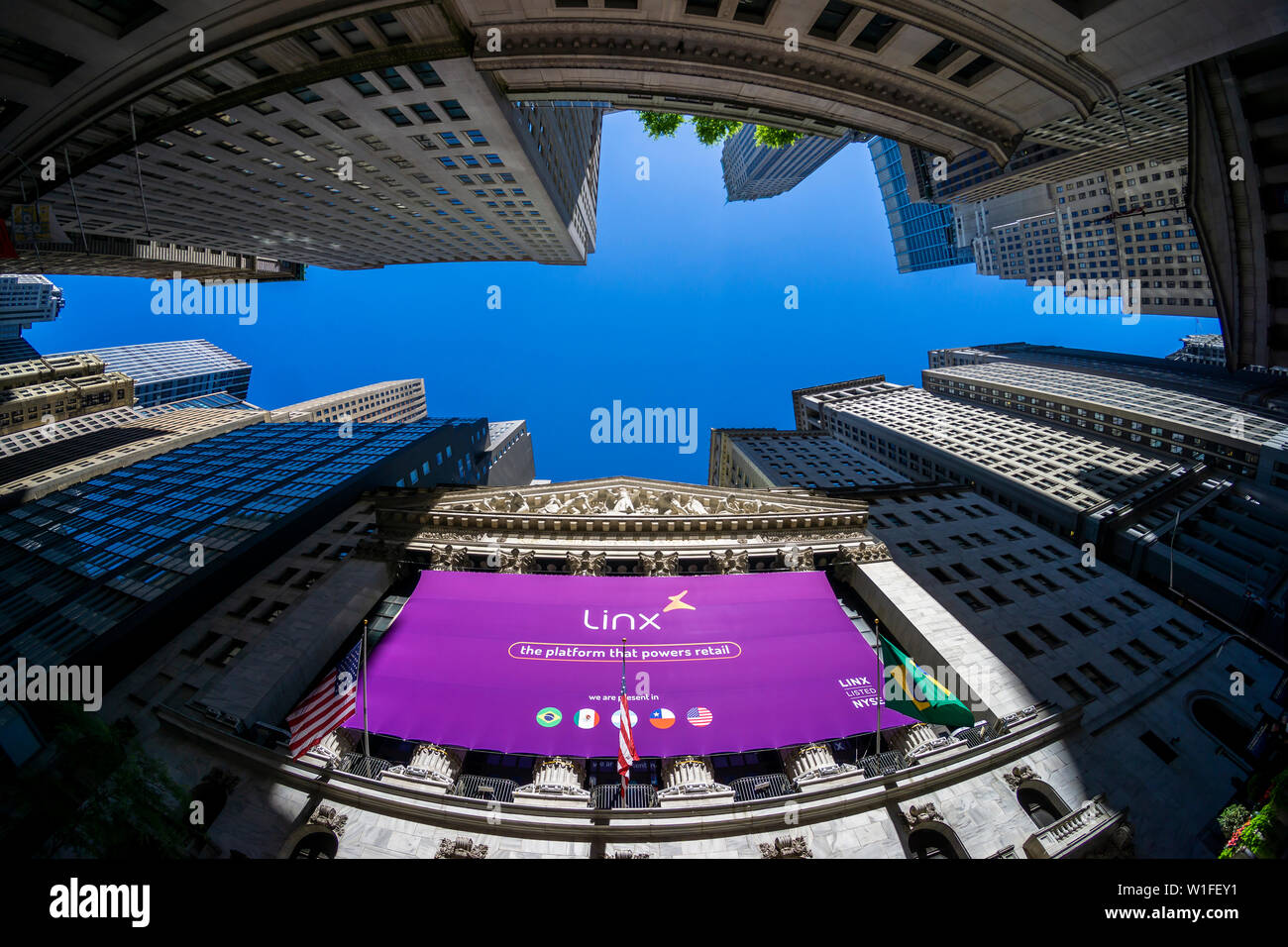 The New York Stock Exchange in Lower Manhattan in New York on Wednesday June 26, 2019 is decorated with a banner for the Linx initial public offering. Linx is a Brazilian POS/ERP connectivity software company which facilitates payment services. (© Richard B. Levine) Stock Photo