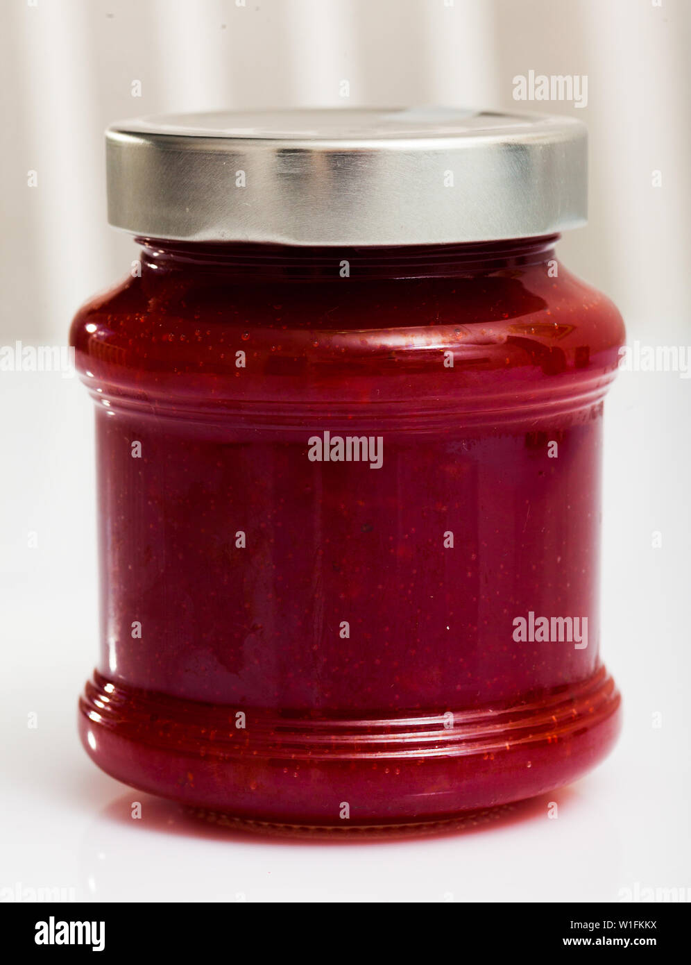 Strawberry jam in a glass jar Stock Photo - Alamy
