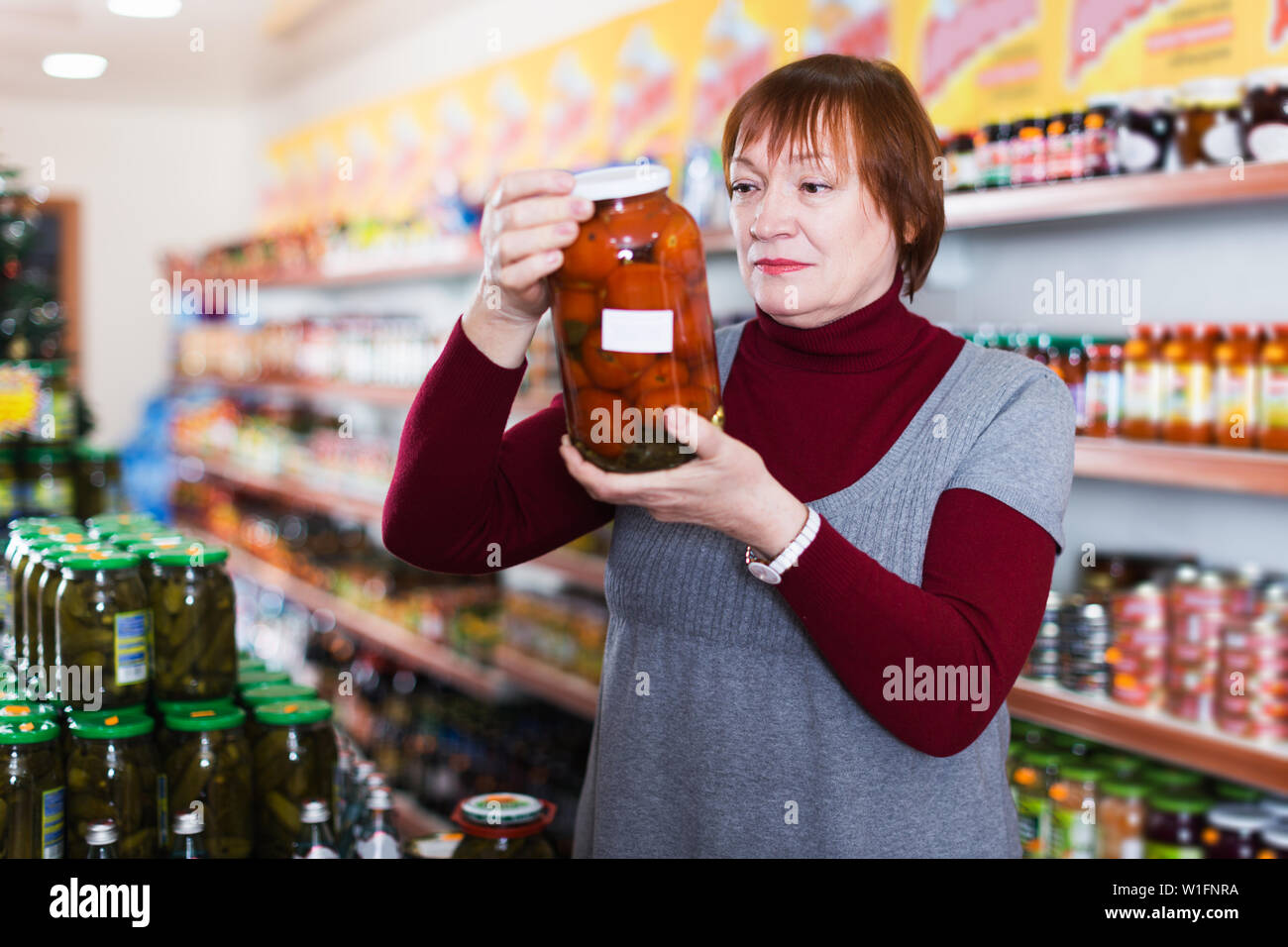 Consumer holding glass jar hi-res stock photography and images - Alamy