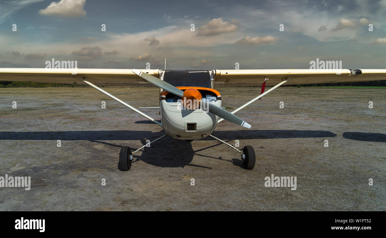 Front view of a historical small airplane after landing, plane Stock Photo