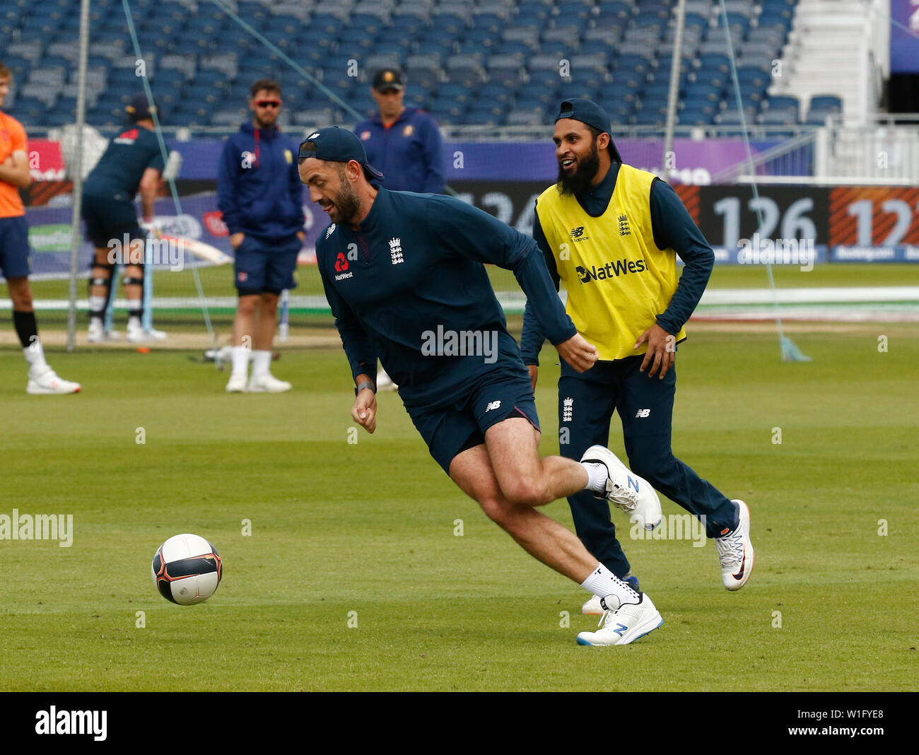 Emirates Riverside, Chester-le-Street, Durham, UK. 2nd July, 2019. ICC World Cup Cricket, Training and Press conferences, Liam Plunkett goes past Adil Rashid as they play football during England's training session this afternoon ahead of tomorrow's final group stage match versus New Zealand Credit: Action Plus Sports/Alamy Live News Stock Photo