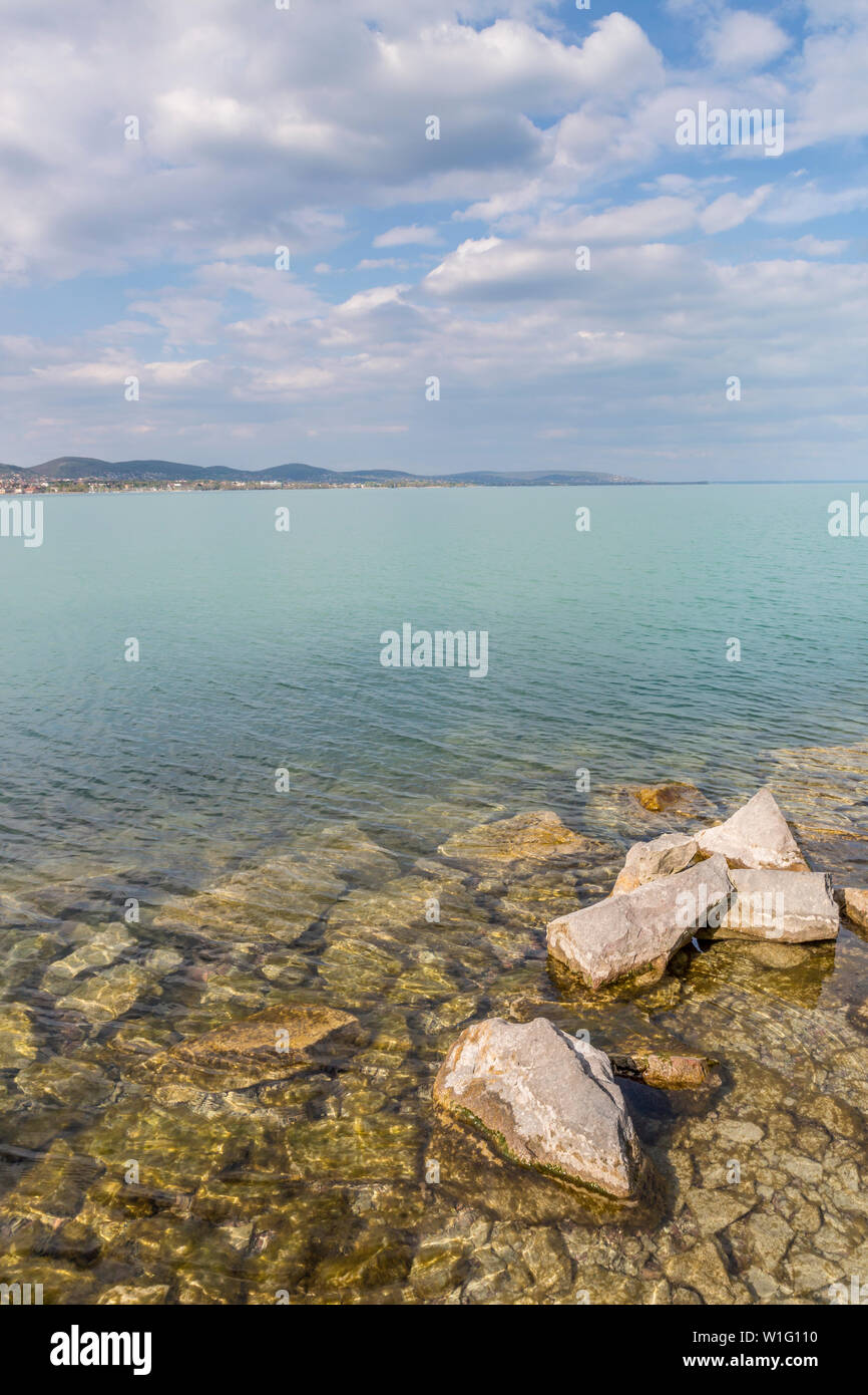 Rocks on the coast and clear waters at Lake Balaton, Hungary Stock Photo