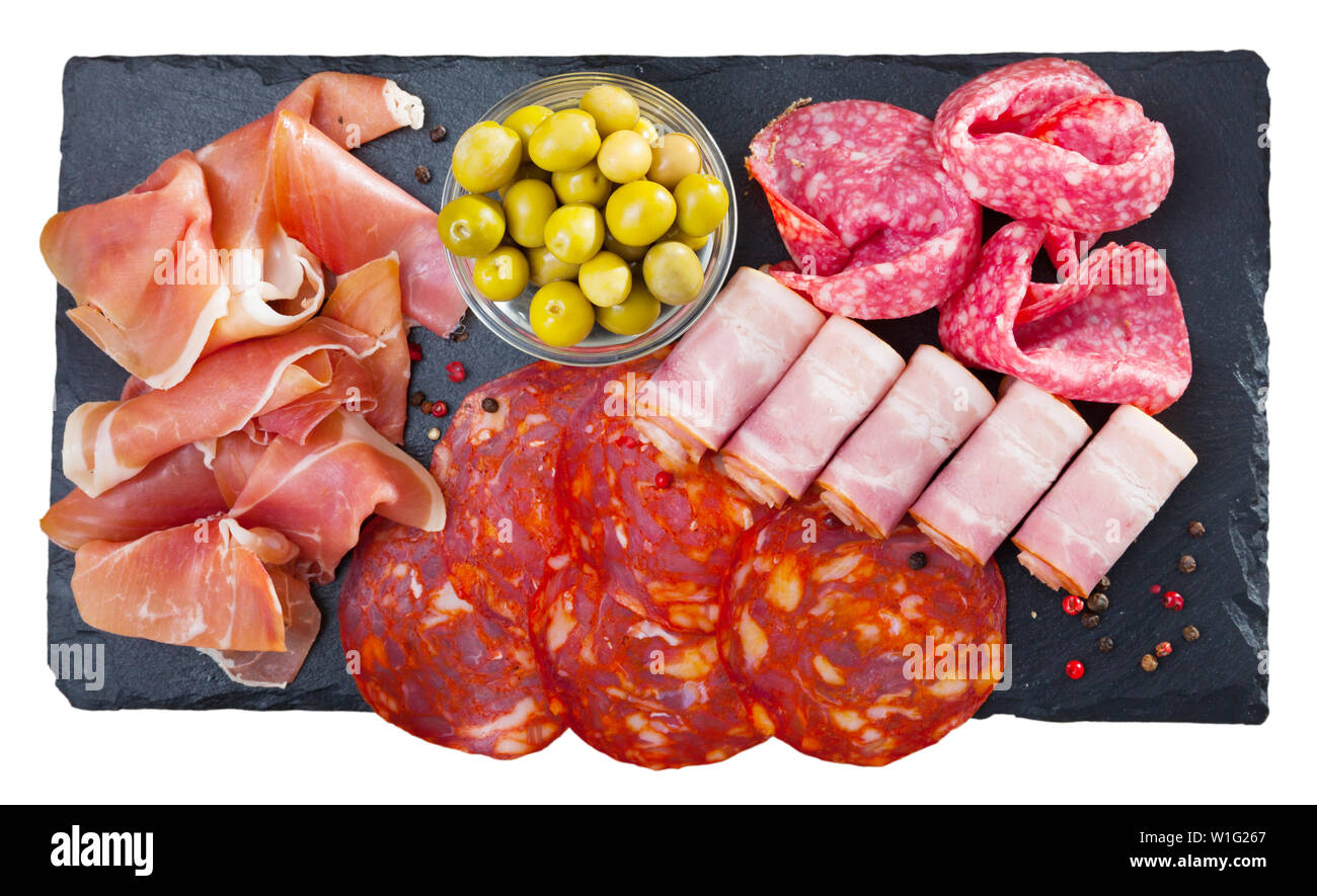 Assorted different types of spanish sausages. Isolated over white