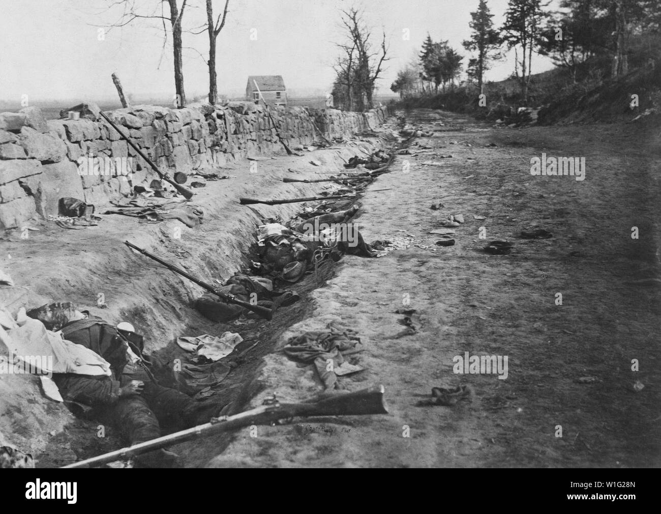 Dead Soldiers in Ditch along Stone Wall, Marye's Heights, Battle of Fredericksburg, December 1862, Photograph by Andrew J. Russell, Published May 3, 1863 Stock Photo