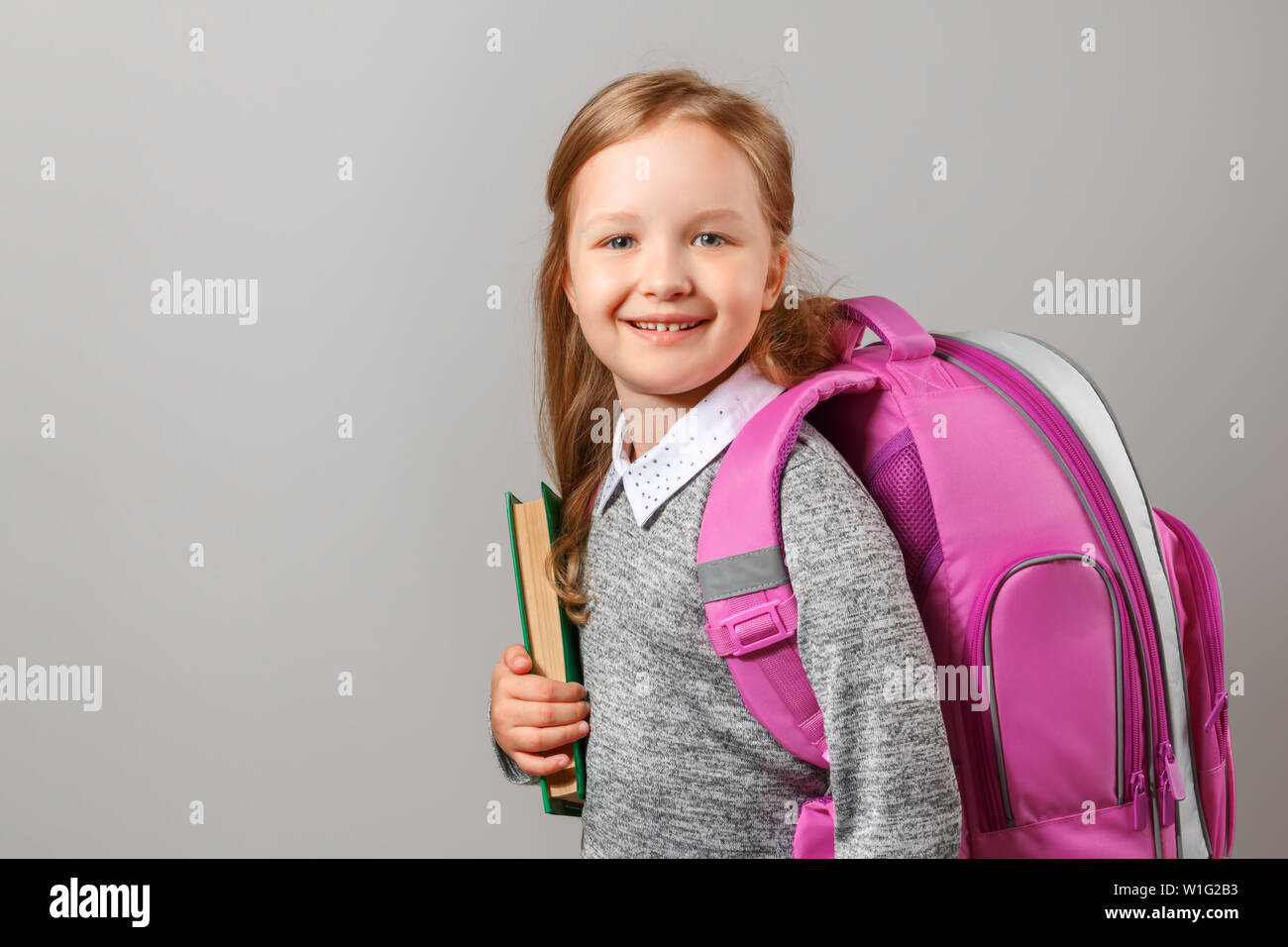 little girl with backpack