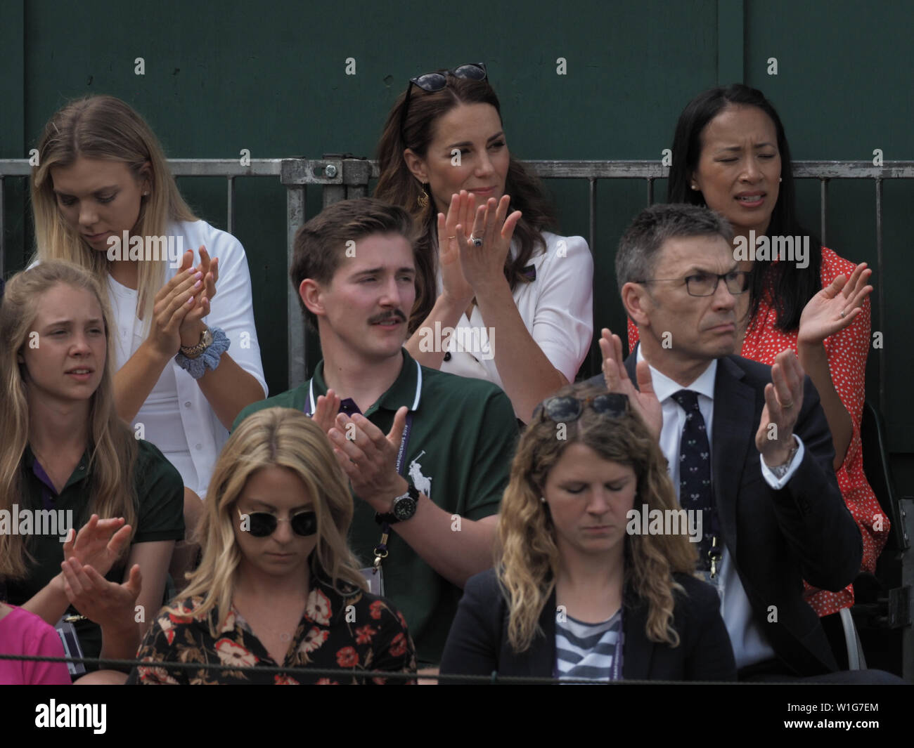 London, UK. 02nd July, 2019. LONDON, ENGLAND - JULY 02: Catherine, Duchess of Cambridge and Anne Keothavong (R) smile as they attend day 2 of the Wimbledon Tennis Championships at the All England Lawn Tennis and Croquet Club on July 02, 2019 in London, England People: Catherine, Duchess of Cambridge, Anne Keothavong Credit: Storms Media Group/Alamy Live News Stock Photo