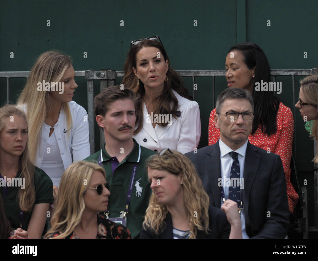London, UK. 02nd July, 2019. LONDON, ENGLAND - JULY 02: Catherine, Duchess of Cambridge and Anne Keothavong (R) smile as they attend day 2 of the Wimbledon Tennis Championships at the All England Lawn Tennis and Croquet Club on July 02, 2019 in London, England People: Catherine, Duchess of Cambridge, Anne Keothavong Credit: Storms Media Group/Alamy Live News Stock Photo