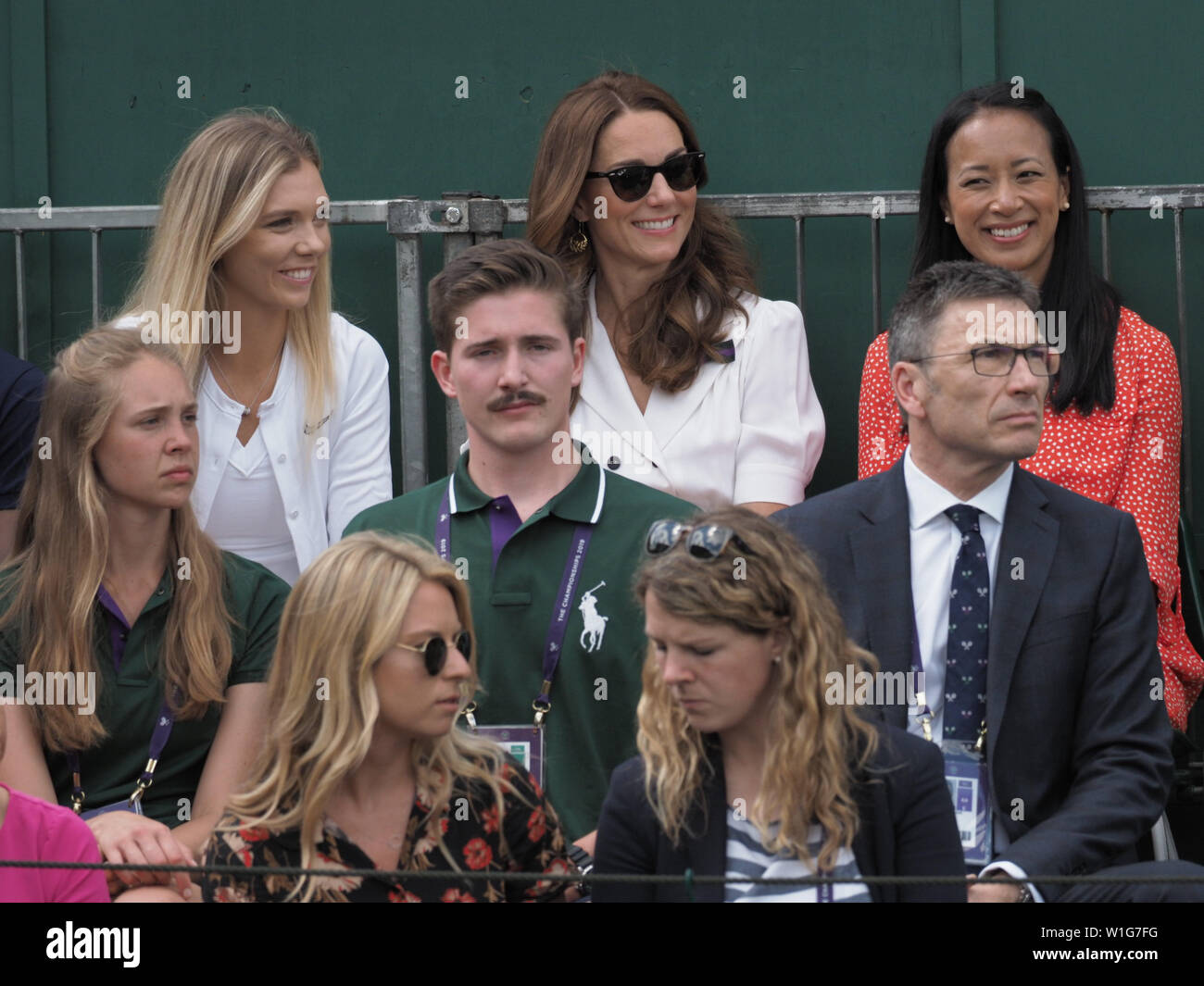 London, UK. 02nd July, 2019. LONDON, ENGLAND - JULY 02: Catherine, Duchess of Cambridge and Anne Keothavong (R) smile as they attend day 2 of the Wimbledon Tennis Championships at the All England Lawn Tennis and Croquet Club on July 02, 2019 in London, England People: Catherine, Duchess of Cambridge, Anne Keothavong Credit: Storms Media Group/Alamy Live News Stock Photo
