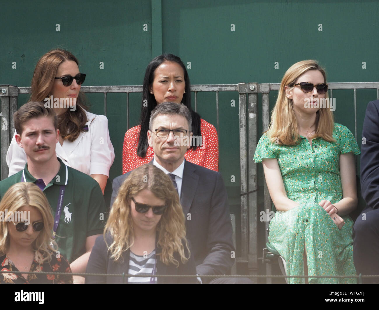 London, UK. 02nd July, 2019. LONDON, ENGLAND - JULY 02: Catherine, Duchess of Cambridge and Anne Keothavong (R) smile as they attend day 2 of the Wimbledon Tennis Championships at the All England Lawn Tennis and Croquet Club on July 02, 2019 in London, England People: Catherine, Duchess of Cambridge, Anne Keothavong Credit: Storms Media Group/Alamy Live News Stock Photo