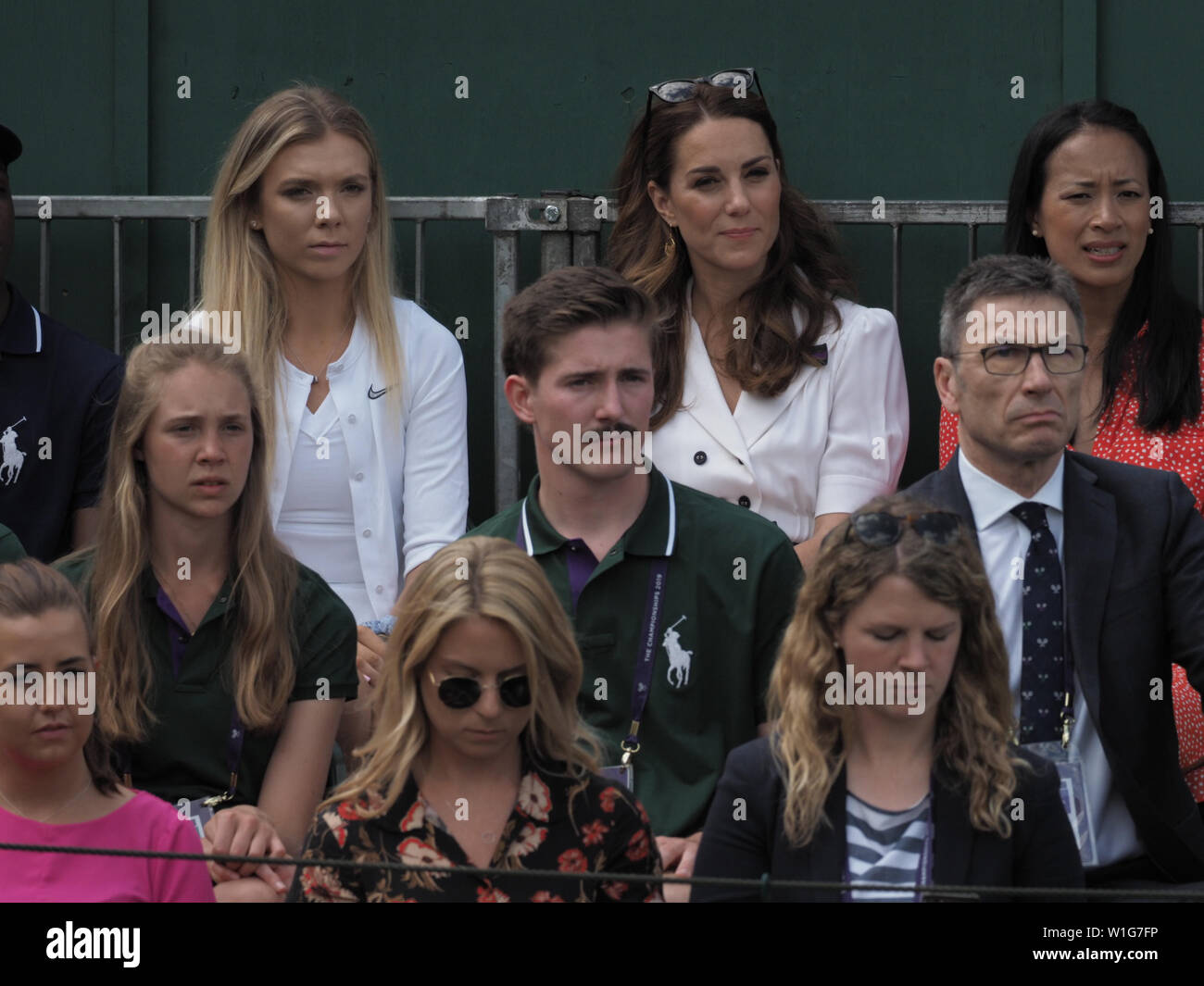 London, UK. 02nd July, 2019. LONDON, ENGLAND - JULY 02: Catherine, Duchess of Cambridge and Anne Keothavong (R) smile as they attend day 2 of the Wimbledon Tennis Championships at the All England Lawn Tennis and Croquet Club on July 02, 2019 in London, England People: Catherine, Duchess of Cambridge, Anne Keothavong Credit: Storms Media Group/Alamy Live News Stock Photo
