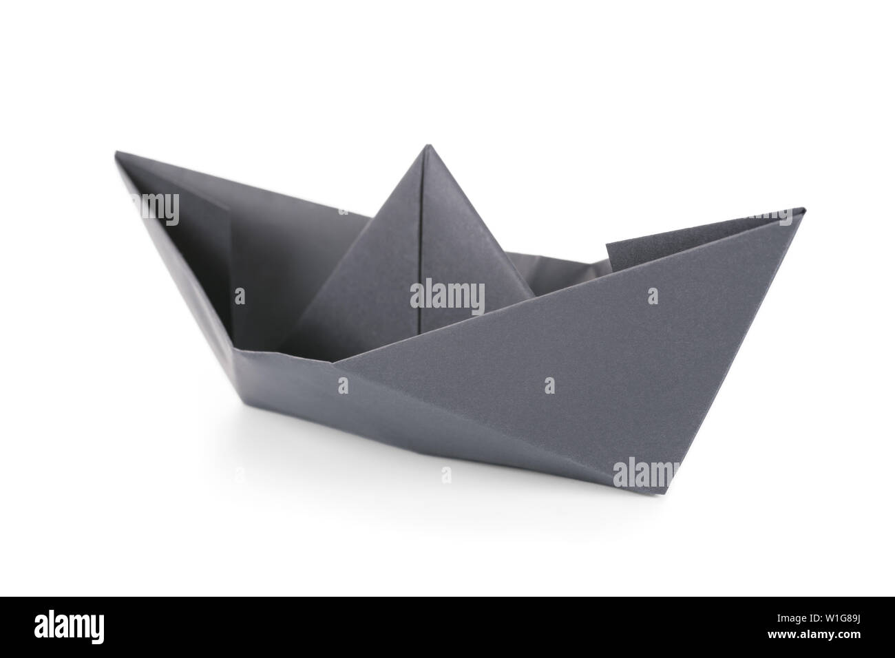 Black paper boat isolated on white Stock Photo