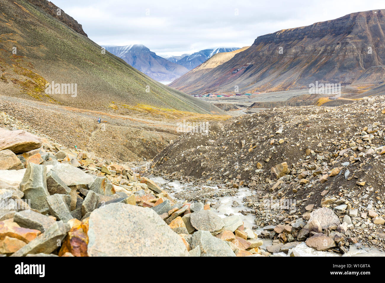 Hiking behind Longyearbyen towards glacier in the arctic tundra of Svalbard or Spitsbergen, northern Norway Stock Photo