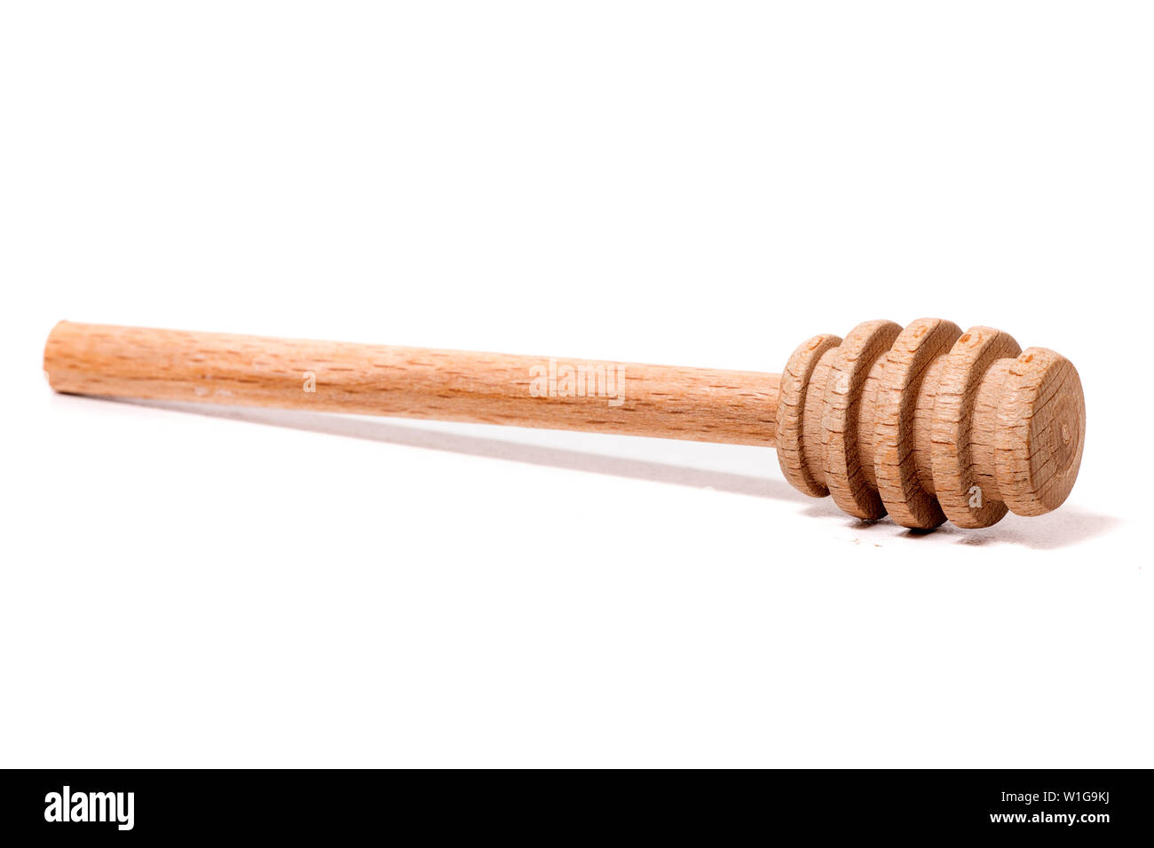 honey dipper tool isolated on a white background Stock Photo Alamy