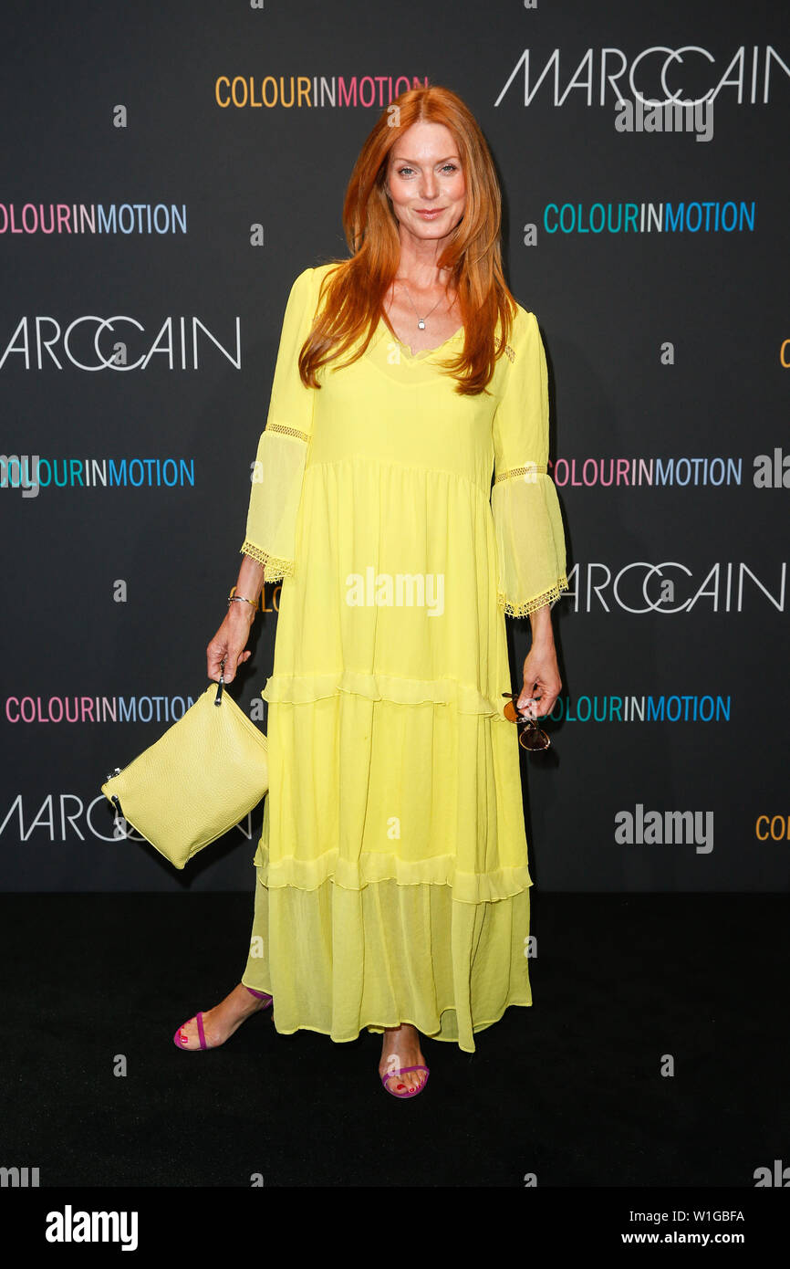 Berlin, Germany. 02nd July, 2019. Esther Schweins, actress, comes over the carpet to the show of designer Marc Cain in the Velodrom. The collections for Spring/Summer 2019 will be presented at Berlin Fashion Week. Credit: Gerald Matzka/dpa-Zentralbild/dpa/Alamy Live News Stock Photo