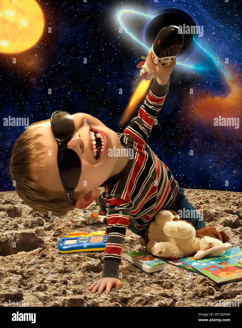 child with wild imagination playing with toys Stock Photo
