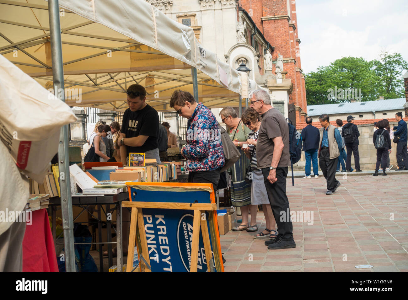 Tourists looking for Books in Krakow Flea Market, Krakow, Poland, Europe, Stock Photo