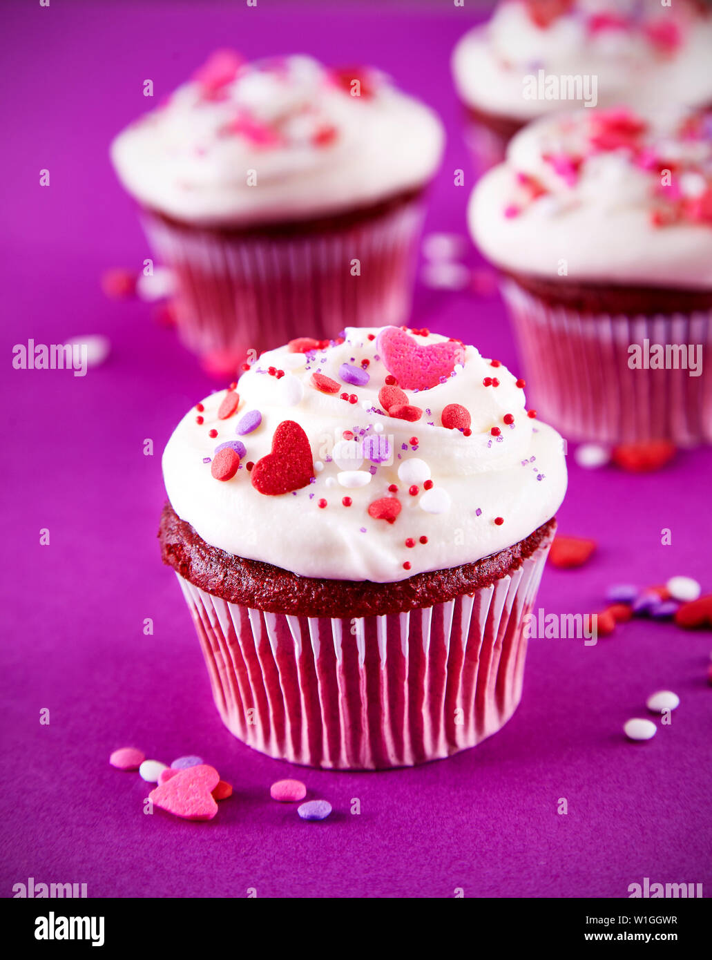 Delicious Valentine cupcakes with sprinkles Stock Photo