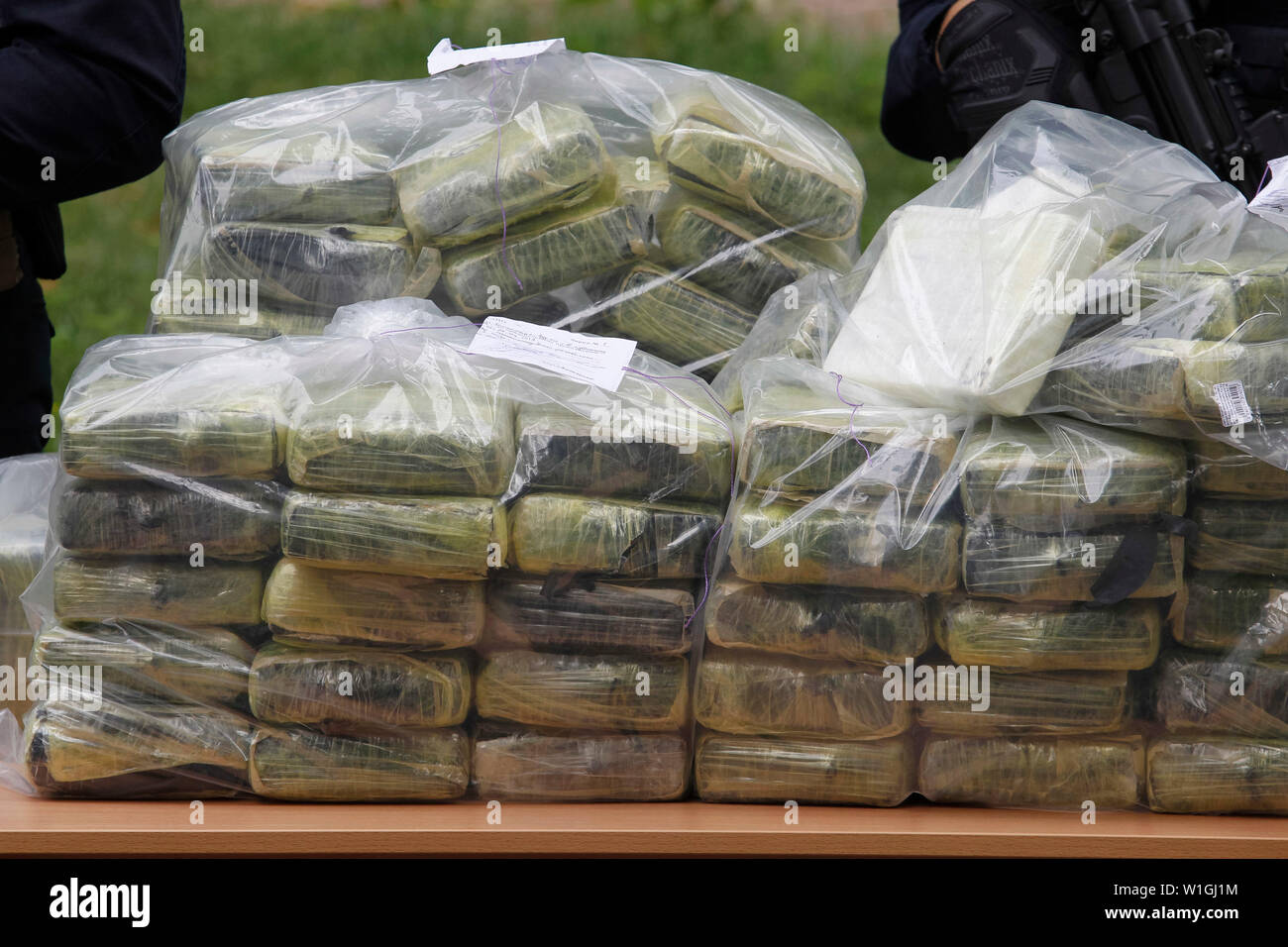 Bags of cocaine, which were seized during a special police operation, are seen at a press conference of the National Police and the Anti-Narcotic Police Department and the U.S. Department of the Drug Enforcement Administration (DEA) in the Ministry of Internal Affairs in Kiev.Ukrainian police in cooperation with the U.S. DEA revealed the transnational drug trafficking channel from Colombia to the EU and detained drug dealers and seized about 400 kg of cocaine estimated cost of 60 million US dollars, which were to be transferred from Latin America through Ukraine to Europe by a suspected intern Stock Photo