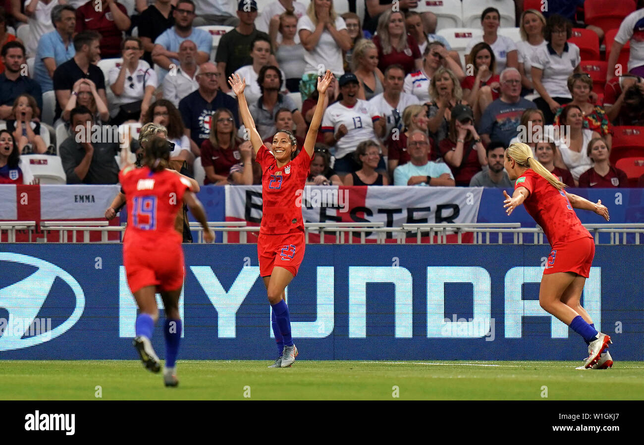 USA's Christen Press (centre) celebrates scoring her side's first goal of the game with team-mates during the FIFA Women's World Cup Semi Final match at the Stade de Lyon. Stock Photo