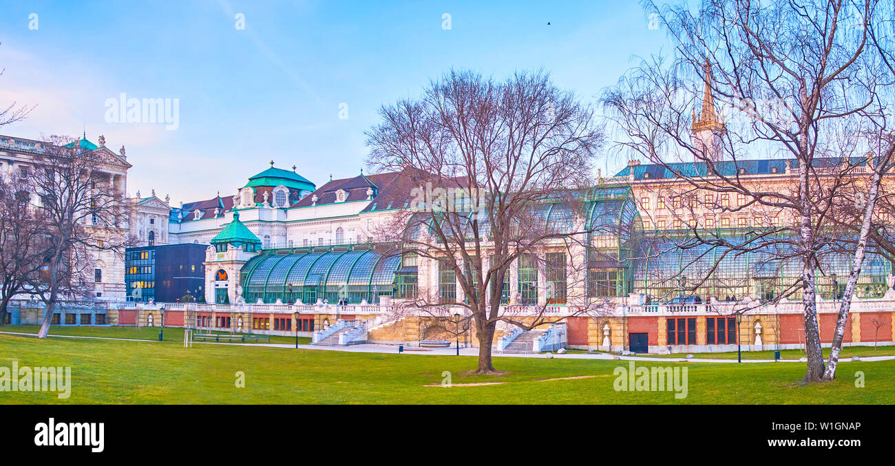 VIENNA, AUSTRIA - FEBRUARY 18, 2019: The beautiful Palmenhaus (Palm House) with glass roof is one of the most notable landmarks of Burggarten, is func Stock Photo