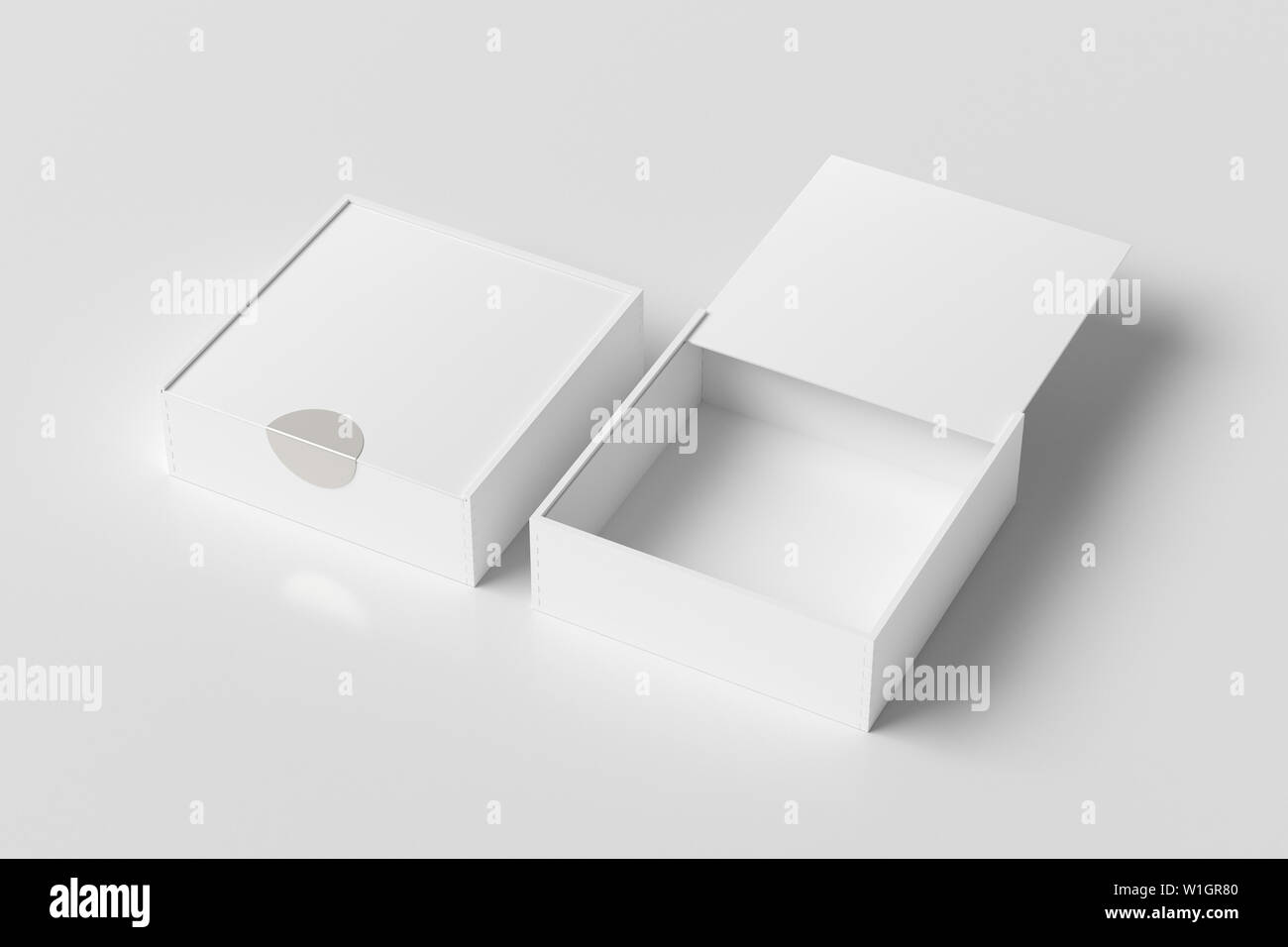 Two white square boxes with sliding lid on white background. Empty