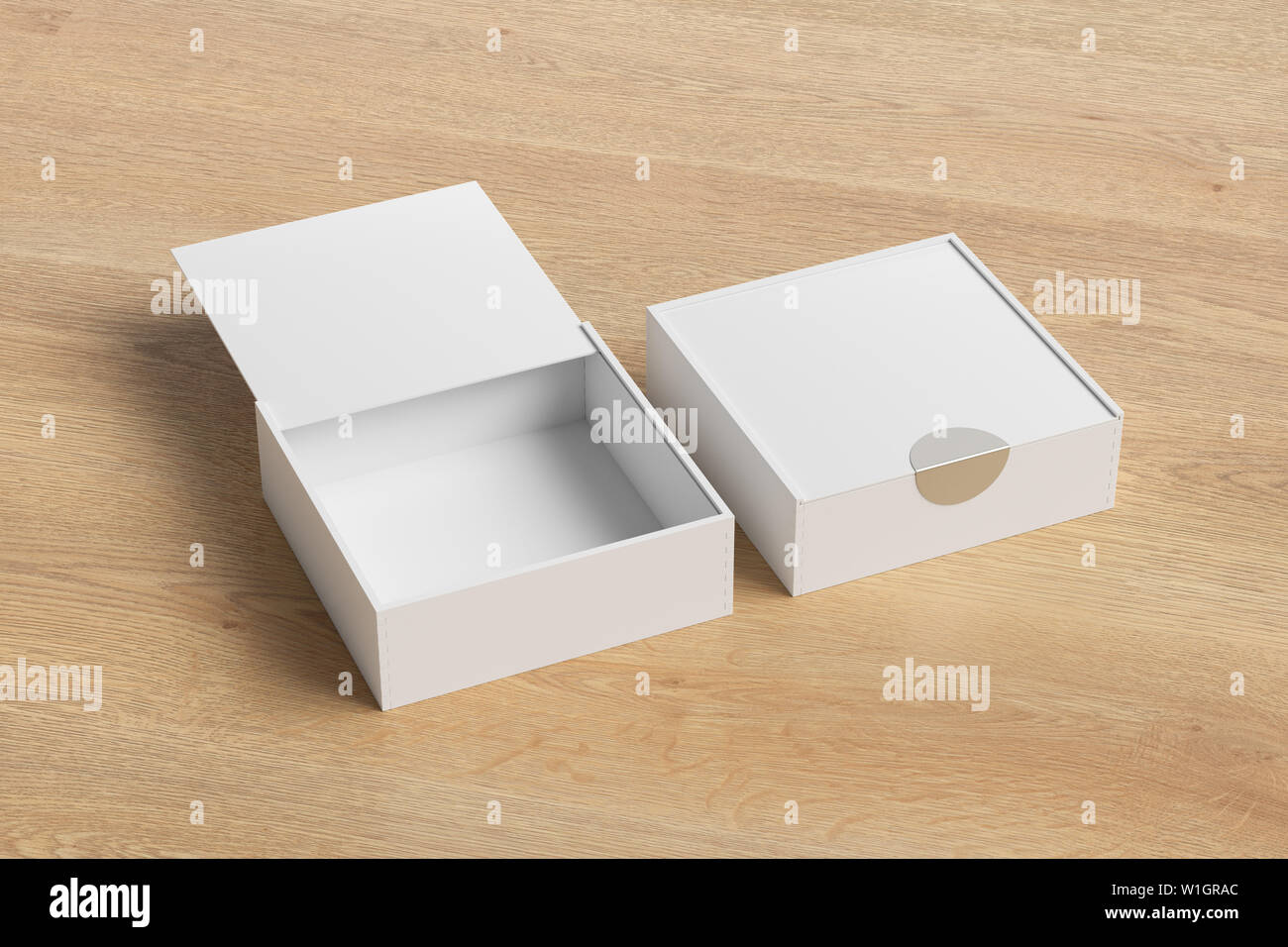 Two white square boxes with sliding lid on wooden background. Empty