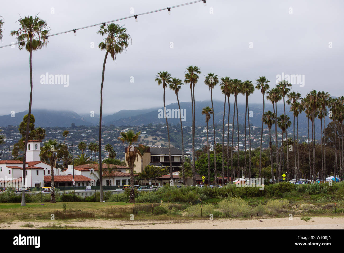 View of Santa Barbara West Coast town with colonial buildings and palm ...