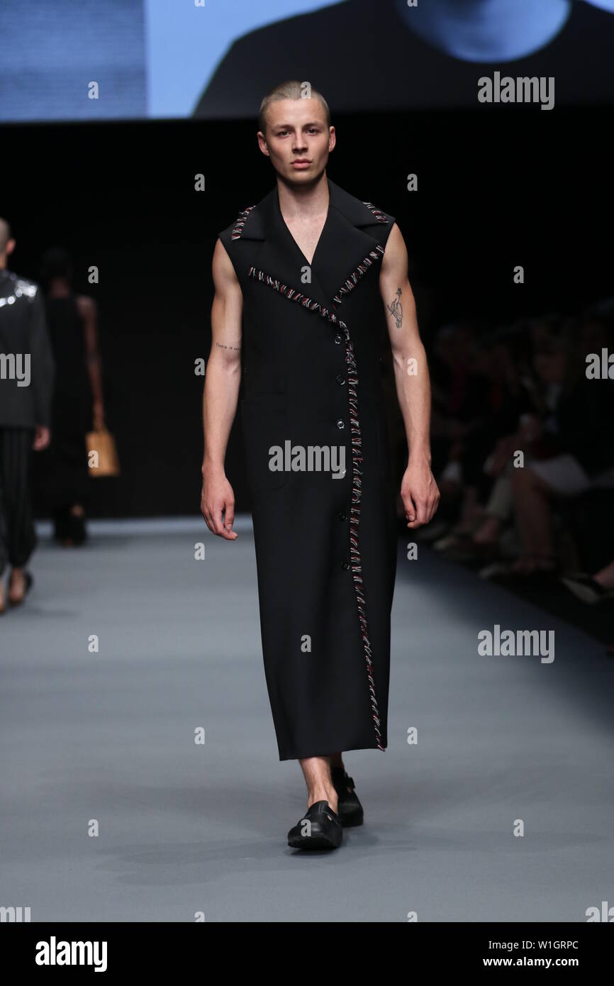 Models walk the runway at the Richert Beil show during the Mercedes ...