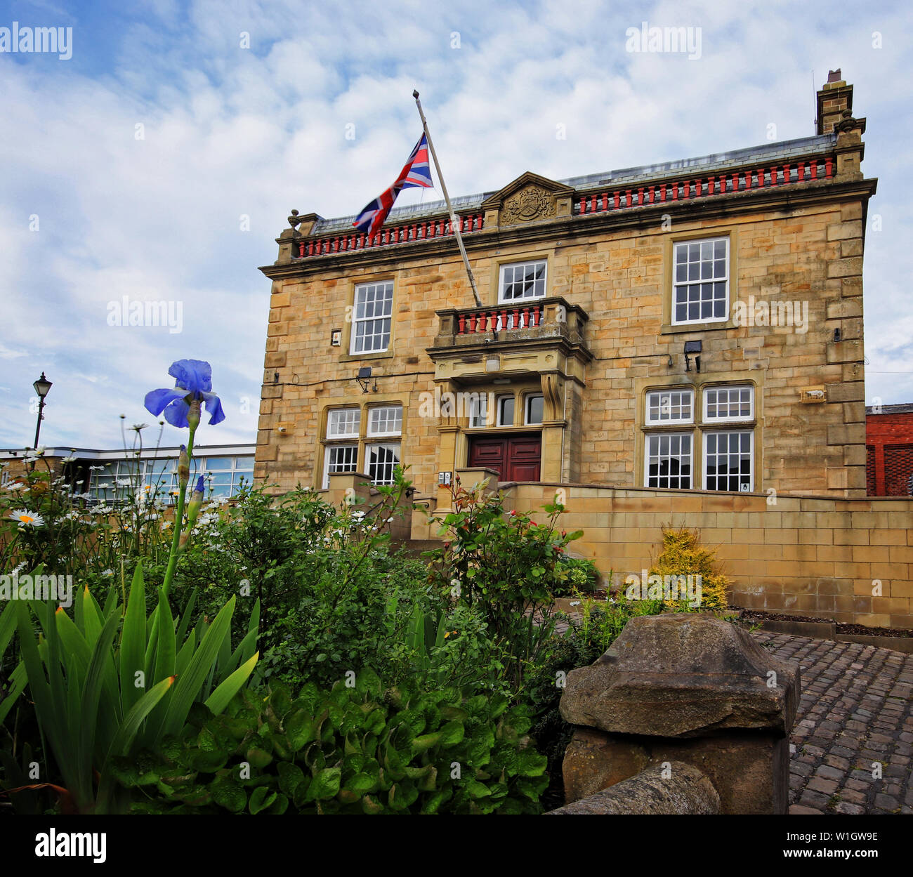 Brierfield Town Hall, viewed from the roadside flower bed Stock Photo