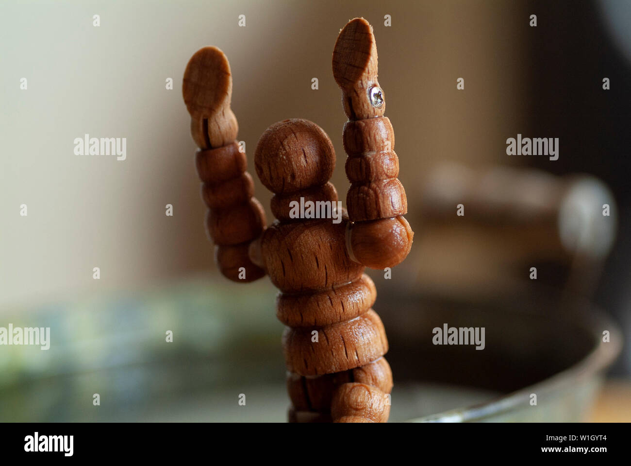 TRANSPORTED MAN Harrowing tale of a time travel experiment gone wrong leaving a wooden man in a paradox of constantly evolving and changing realities. Stock Photo