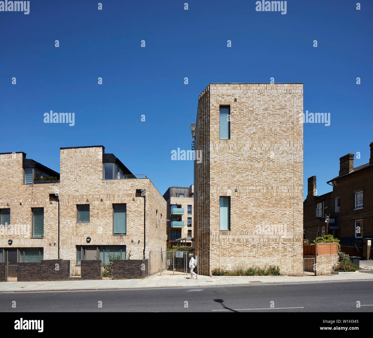 Front elevation of street facade. Stonebridge Park, London, United Kingdom. Architect: Cullinan Studio, 2016. Stock Photo