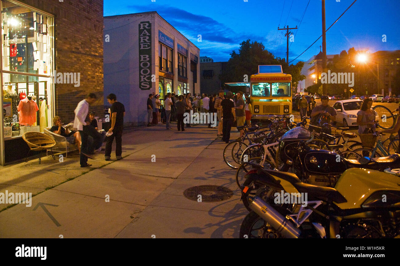Crowds gather around the Chow truck during the Broadway Gallery Stroll
