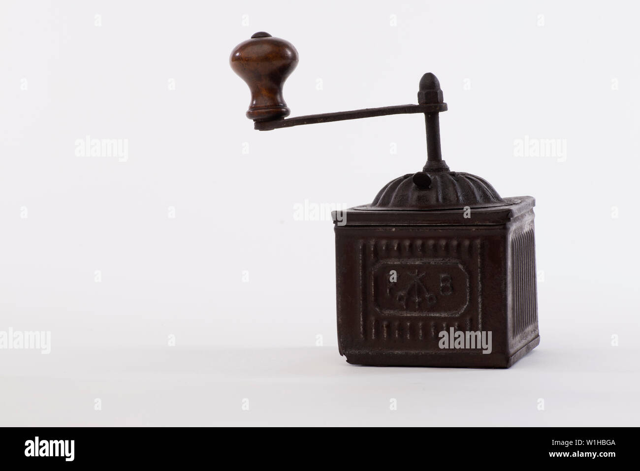 Pepper grinder, Vintage brass pepper mill isolated on white background