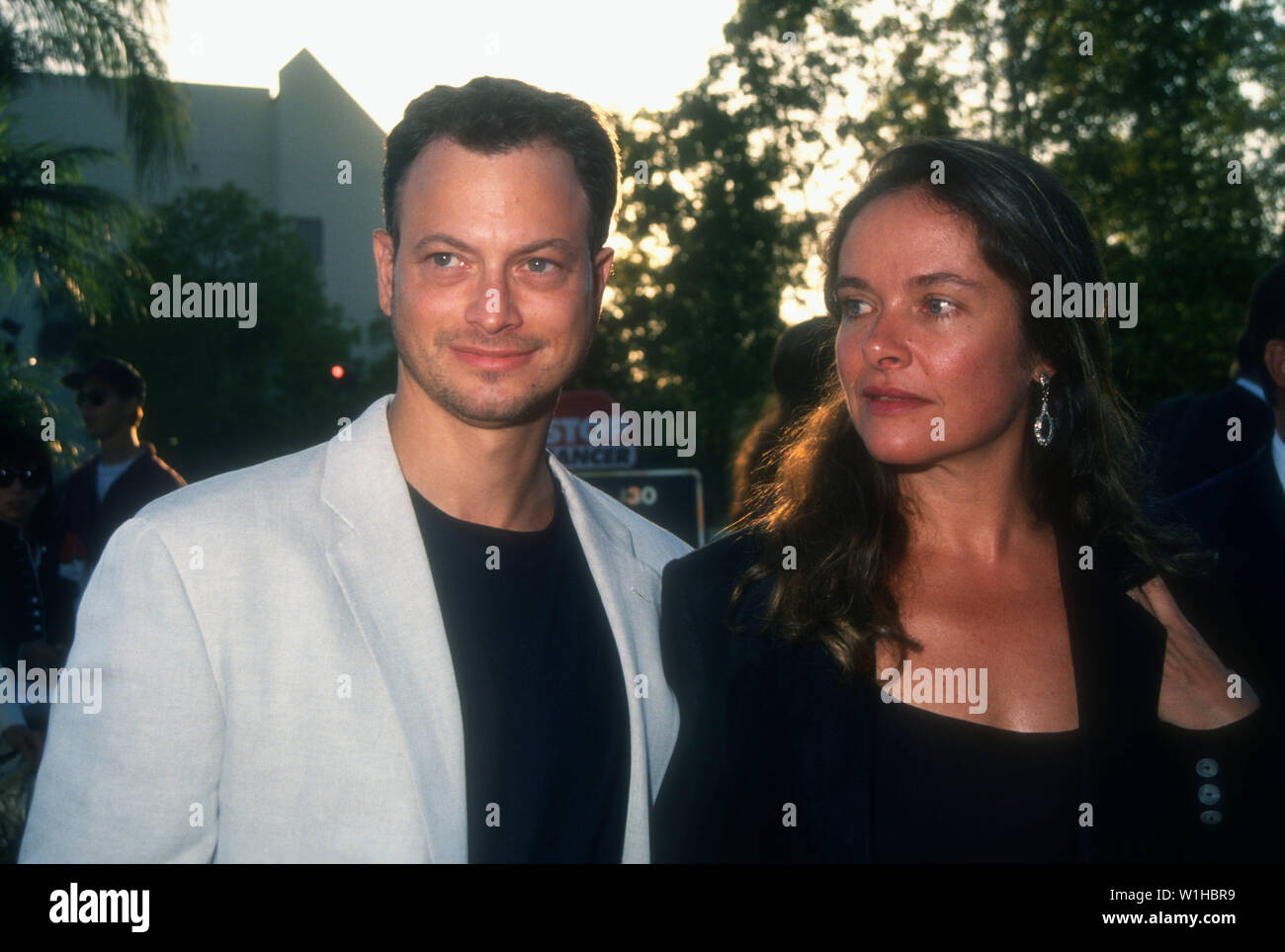 Hollywood, California, USA 3rd August 1994 Actor Gary Sinise and wife actress Moira Harris attend the 'Clear and Present Danger' Hollywood Premiere on August 3, 1994 at Paramount Pictures Studios in Hollywood, California, USA. Photo by Barry King/Alamy Stock Photo Stock Photo