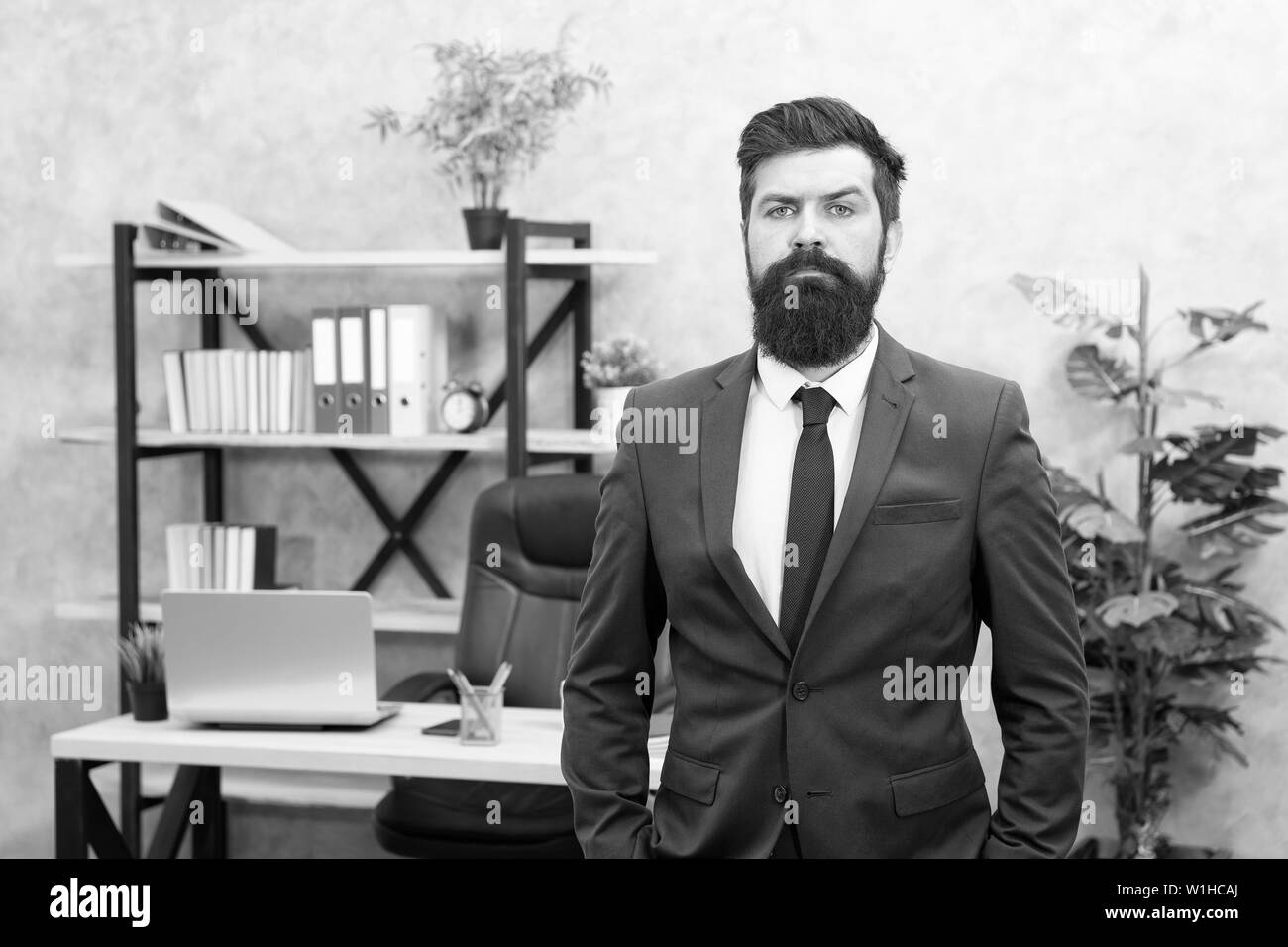 Office staff. HR director. HR management. HR job description. Head of human resources department. Man bearded serious office background. Provide consultation to management on strategic staffing plans. Stock Photo